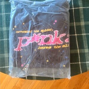 Trendy Black Crewneck Sweater with Pink Graphic